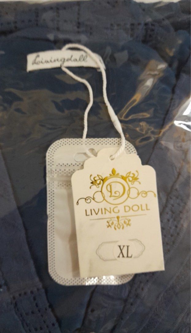 Living doll Amanda Dress (Category: Dresses) located in Quezon. Submitted by ourwelllovestuff (Listing ID 1343364026, Image 3). Description: Used once only XL on tag Navy blue eyelet, super nice fabric.