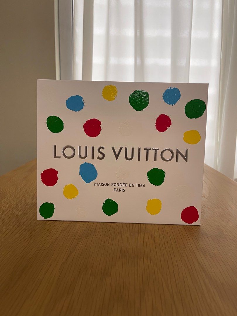 Louis Vuitton original paper bag (Category: Luxury Bags & Wallets) located in Manila. Submitted by lessismore_9x (Listing ID 1343248734, Image 3). Description: This is an original paper bag from Louis Vuitton, available in various sizes. The price may differ based on the size of the paper bag. It is brand new and has never been used, remaining in pristine condition. Price range: 500 - 3,000pesos depending on size and design. For more details, ple