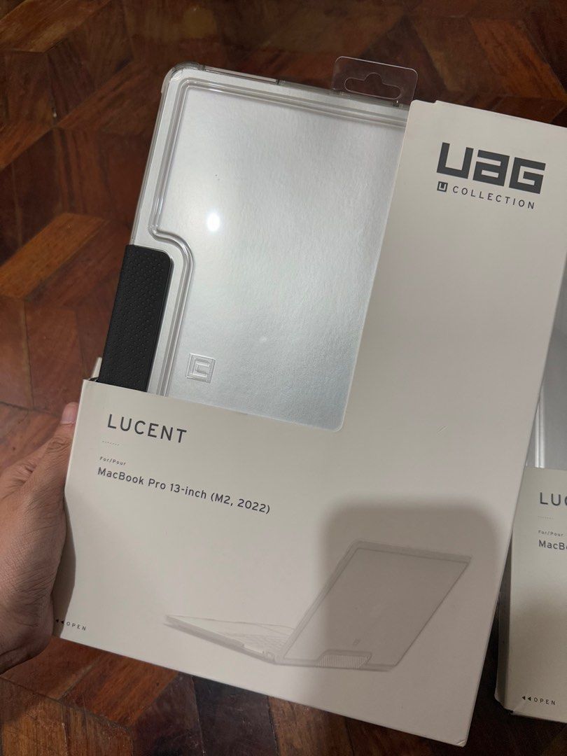 Original UAG Lucent Case for Macbook Pro 13 inch 2022 M2 (Category: Laptop Bags & Sleeves) located in Manila. Submitted by razelysonn (Listing ID 1343286485, Image 3). Description: 1,200 each Below srp already Fixed Price For Macbook Pro 2022 13 inch M2 Some may have light scratch due to being stored that’s why selling low .