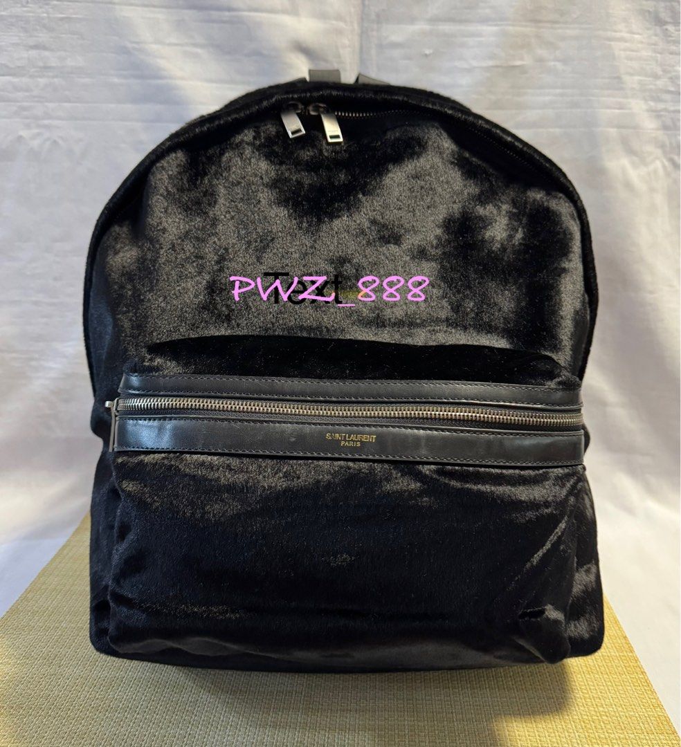 SAINT LAURENT Black Animal Fur Backpack (Category: Luxury Bags & Wallets) located in Baguio. Submitted by pwz-eshop (Listing ID 1343255438, Image 1). Description: • I do not reserve items. I only mark items as reserved when it is paid. Paid items are shipped the next day. No shipping on holidays. • I do not have when worn pictures, please rely on actual dimensions for sizing. • Up for Grabs!! • Flaws: Minor dirt marks on lining. Detached lining a
