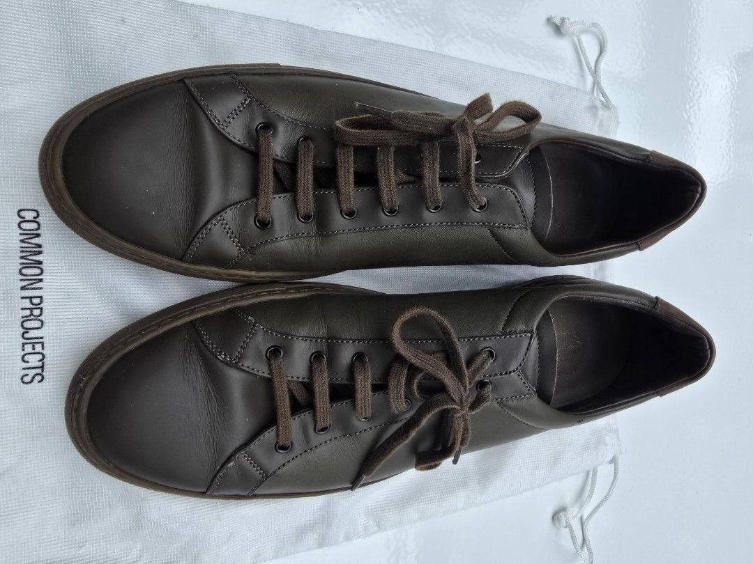 Common Projects (Category: Sneakers) located in Singapore. Submitted by arr1881 (Listing ID 1343475832, Image 2). Description: Deep Green to Brown Low cut casual Sneakers. It's hardly used & too many of the same type, so selling off..