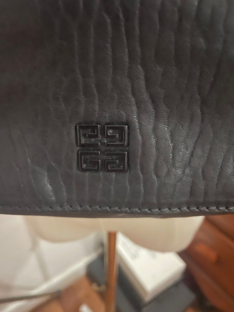 RUSH SALE! GIVENCHY Melanchola Shoulder Bag (Category: Luxury Bags & Wallets) located in Paranaque City. Submitted by elegantlycheap (Listing ID 1343491799, Image 3). Description: Very Nice leather No rubs nor any cracks on the leather Please SELF AUTHENTICATE CODED With generic dust bag .