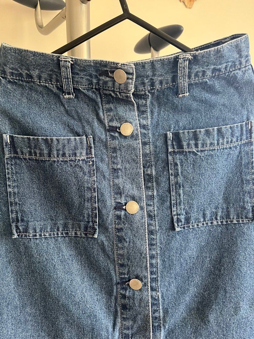 GU denim frayed button down pocketed long skirt (Category: Skirts) located in Makati City. Submitted by raid.my.closet (Listing ID 1343392233, Image 2). Description: Used once GU denim frayed button down pocketed long skirt.