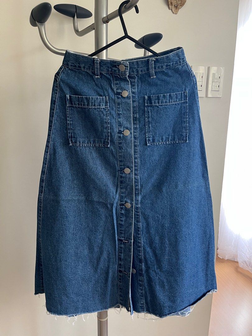 GU denim frayed button down pocketed long skirt (Category: Skirts) located in Makati City. Submitted by raid.my.closet (Listing ID 1343392233, Image 1). Description: Used once GU denim frayed button down pocketed long skirt.