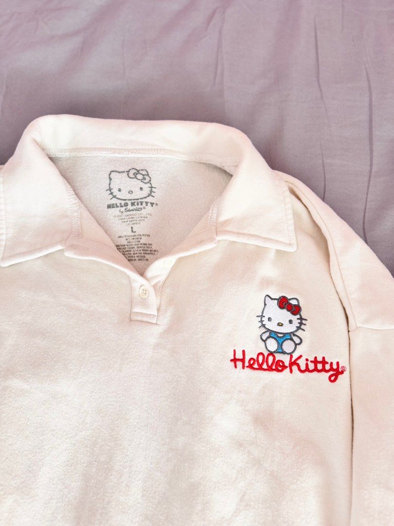 Hello Kitty (Sanrio) Long sleeve polo Classic (Category: Activewear) located in Nasugbu. Submitted by _mainbudols (Listing ID 1343399942, Image 2). Description: Searchable sa sanrio Original Issue : May stain lang ( pwede pa matanggal) Color white.