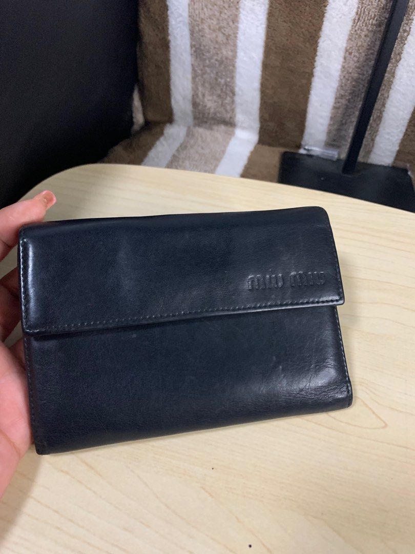MiuMiu vintage leather medium wallet (Category: Luxury Bags & Wallets) located in Cabanatuan. Submitted by mjluxxejapan (Listing ID 1343412363, Image 1). Description: Fixed price.good cond.mo major flaws light signs of aged only.gandaa ng leather medium sz approx 6”x4” all details posted .