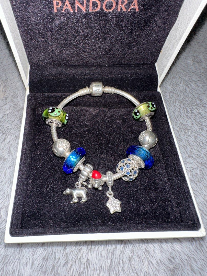 Pandora with Bracelet and 10 Charms! (Category: Bracelets) located in Quezon City. Submitted by domcheng (Listing ID 1343462264, Image 2). Description: The set only includes the star charms and blue charms but I added the 2 green charms and 1 christmas dog. :) bought the set originally for 16,000.