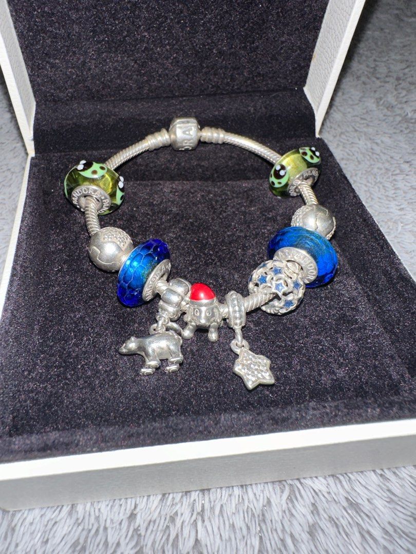 Pandora with Bracelet and 10 Charms! (Category: Bracelets) located in Quezon City. Submitted by domcheng (Listing ID 1343462264, Image 3). Description: The set only includes the star charms and blue charms but I added the 2 green charms and 1 christmas dog. :) bought the set originally for 16,000.
