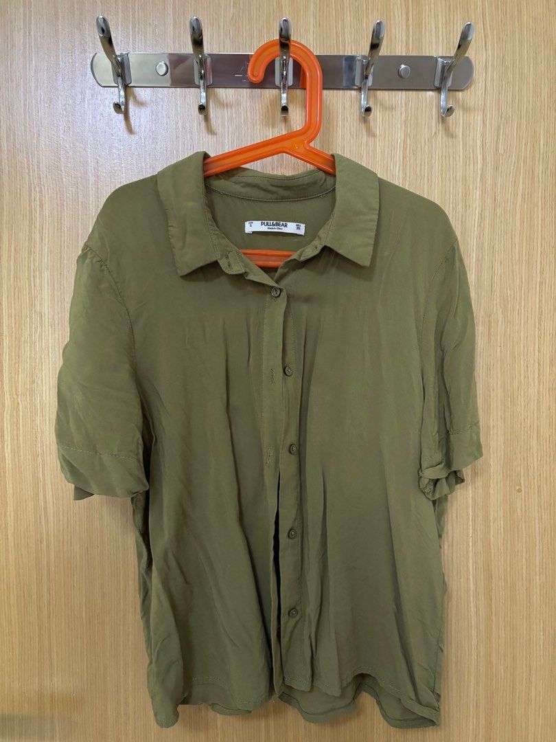 Pull&Bear Olive Green Button-Down (Category: Blouses) located in Singapore. Submitted by nachochachos (Listing ID 1343473190, Image 1). Description: Just clearing out my closet. Worn only once, no defects..