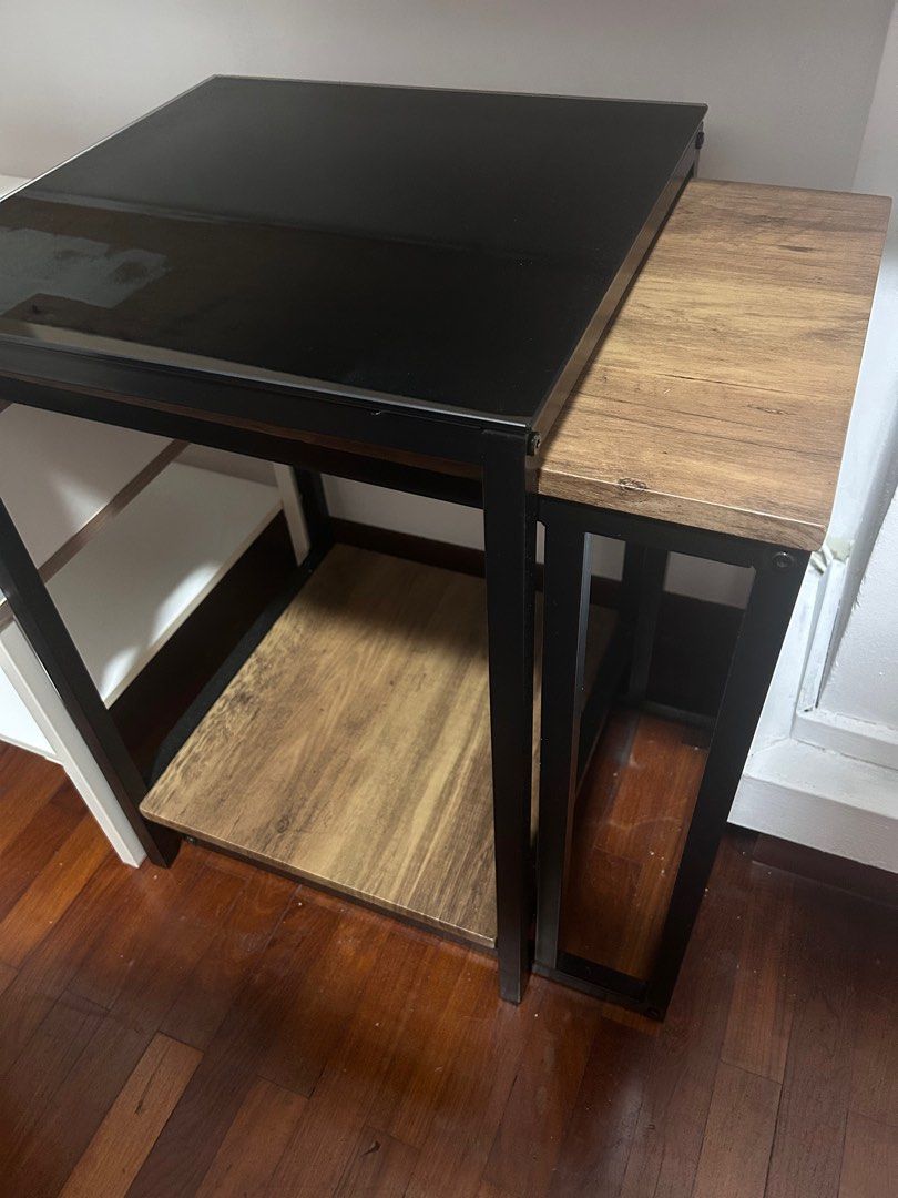 Slim Stackable table (Category: Tables & Sets) located in Singapore. Submitted by crazeinnate (Listing ID 1343435210, Image 1). Description: Pretty much new as it was not heavily used. Both can be slided in to the side of a sofa/bed. Original brought at $95 with 1 top with glass and the other with wood. Glass table: 60cm x 40cm Wooden table: 58cm x 50com.