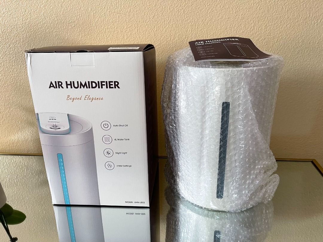 Air Humidifier Purifier bought 3799 branded (Category: Air Purifiers & Dehumidifiers) located in Taguig. Submitted by influenzas (Listing ID 1343680111, Image 1). Description: Only used once No issue .
