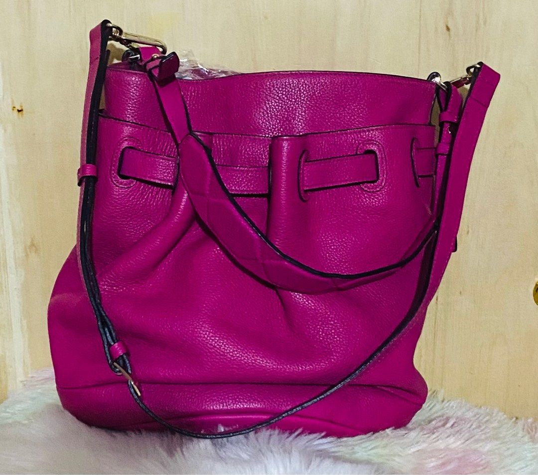 Authentic Bruno Magli (Category: Luxury Bags & Wallets) located in Paranaque City. Submitted by love1927 (Listing ID 1343594608, Image 3). Description: Up for grabs is my Bruno Magli bag in Hot pink made in italy Bought this at Bruno Magli in italy for 400$ This is two way bag In cowhide genuine pebble leather I like this bag but since got many bags i need to let this go Height of the bag is:11 inches Length of the bag:11 inches It has one zip po