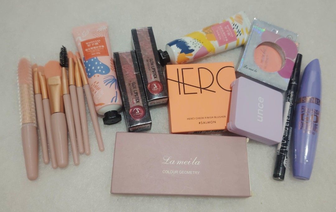 Bundle 1 |Makeup assorted random brand (Category: Makeup) located in Cavite. Submitted by luckyyoueveryday.ph (Listing ID 1343654085, Image 1). Description: Brandnew Makeup Random Brand / Assorted Color Consist of: 1. One Small macaroon make up tools set 2. Two Hand Lotion 3. Two Korean lipstick Lady Kin 4. One Herci Cheek Blusher 5. One Korean Unce Cheek Powder Blush 6. One Lameila 10 color Eyeshadow 7. One Lameila Cheek Blusher 8. One Black Eye