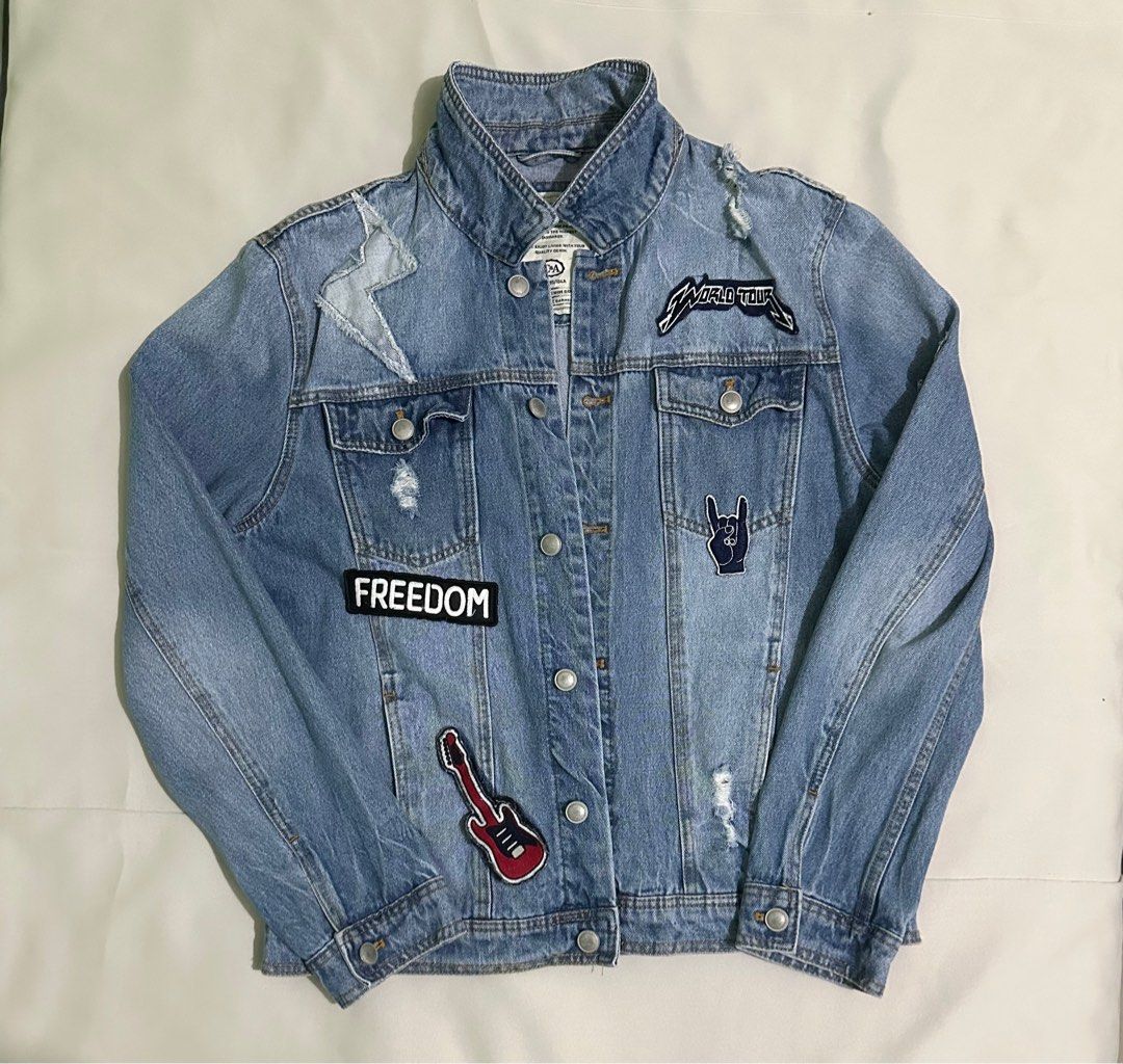 Denim Jacket (Category: Coats, Jackets and Outerwear) located in Makati City. Submitted by andrldch (Listing ID 1343664772, Image 1). Description: Denim Stories Denim Jacket with Stivkers and Pins. No issues L: 27 in W: 21 in.