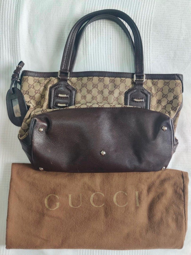Gucci Handbag (Category: Luxury Bags & Wallets) located in Angeles City. Submitted by chocoic3 (Listing ID 1343693838, Image 1). Description: Gucci Handbag lightly used good condition 23k only.