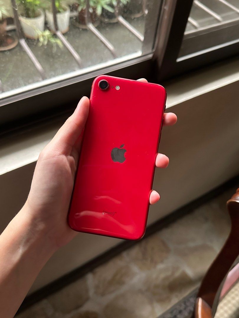 iPhone SE 2020 64GB Red (Category: iPhone SE Series) located in Quezon City. Submitted by alexandria7 (Listing ID 1343612306, Image 3). Description: FOR SALE: iPhone SE 2020 64gb Red - SIM Locked / (but I can contact carrier to unlock if you are not a Globe user) - Reset upon meet - All parts original, never been repaired • All buttons working • Touch ID working • 74% Battery health - Looks good as new Inclusions: • Unit • Case RFS: Bought iPhone