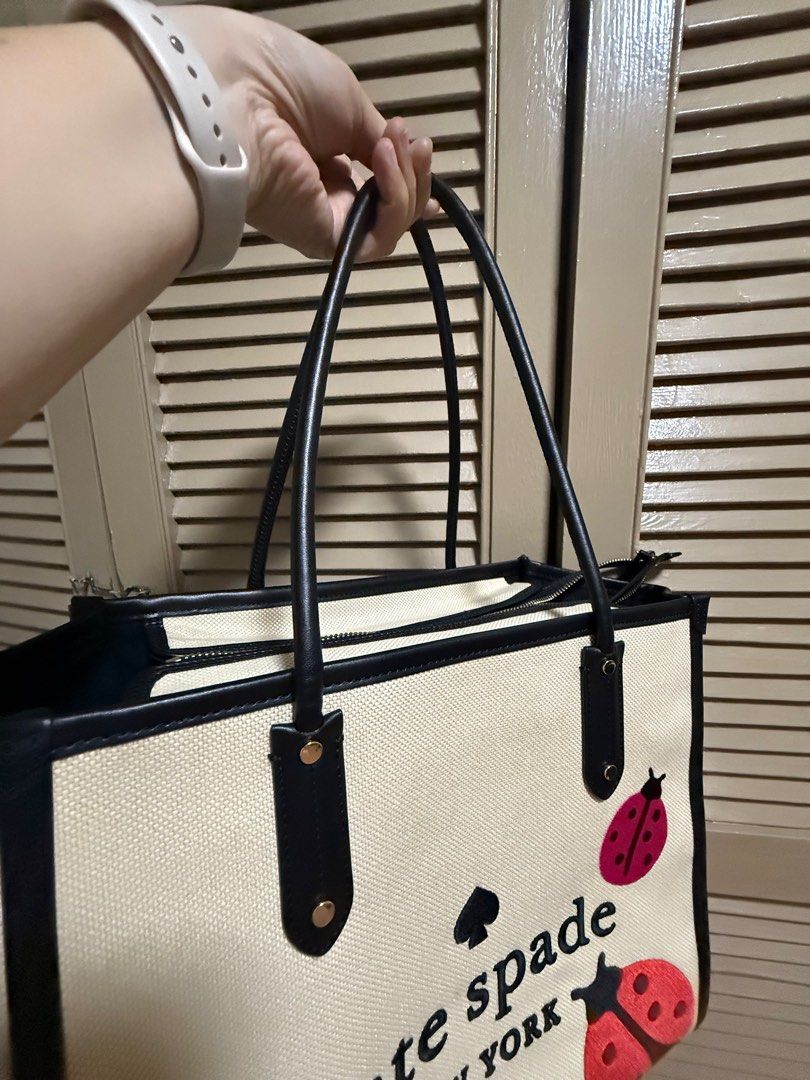 KSpade Preloved Bag Ella Tote Large (Category: Tote Bags) located in Cabuyao City. Submitted by honaluli (Listing ID 1343588705, Image 3). Description: LIKE NEW! Preloved KateSpade Ella Tote Bag Ladybug Canvas Material Embroidered design No tears on leather handles, no scratches Minimal stain as shown in last photo RFS: Decluttering.
