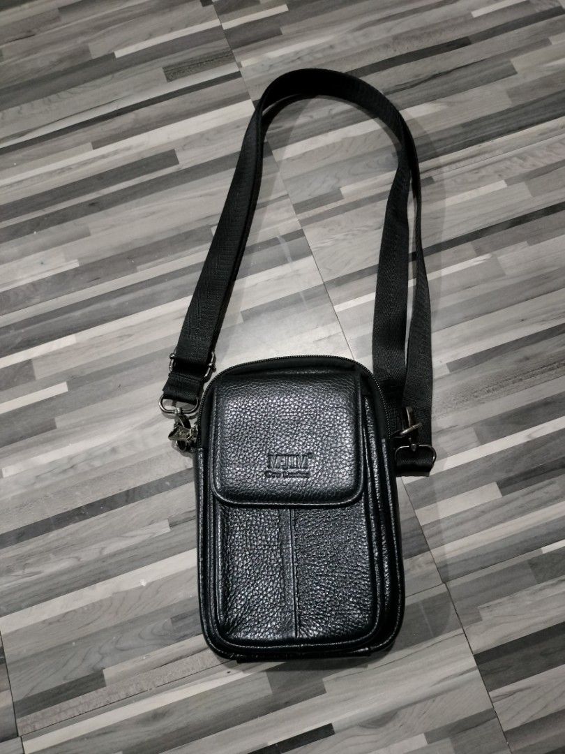 McJIM Black Leather Sling Bag (Category: Wallets & Card Holders) located in Iligan City. Submitted by spetz (Listing ID 1343607206, Image 1). Description: Decluttering my other things..