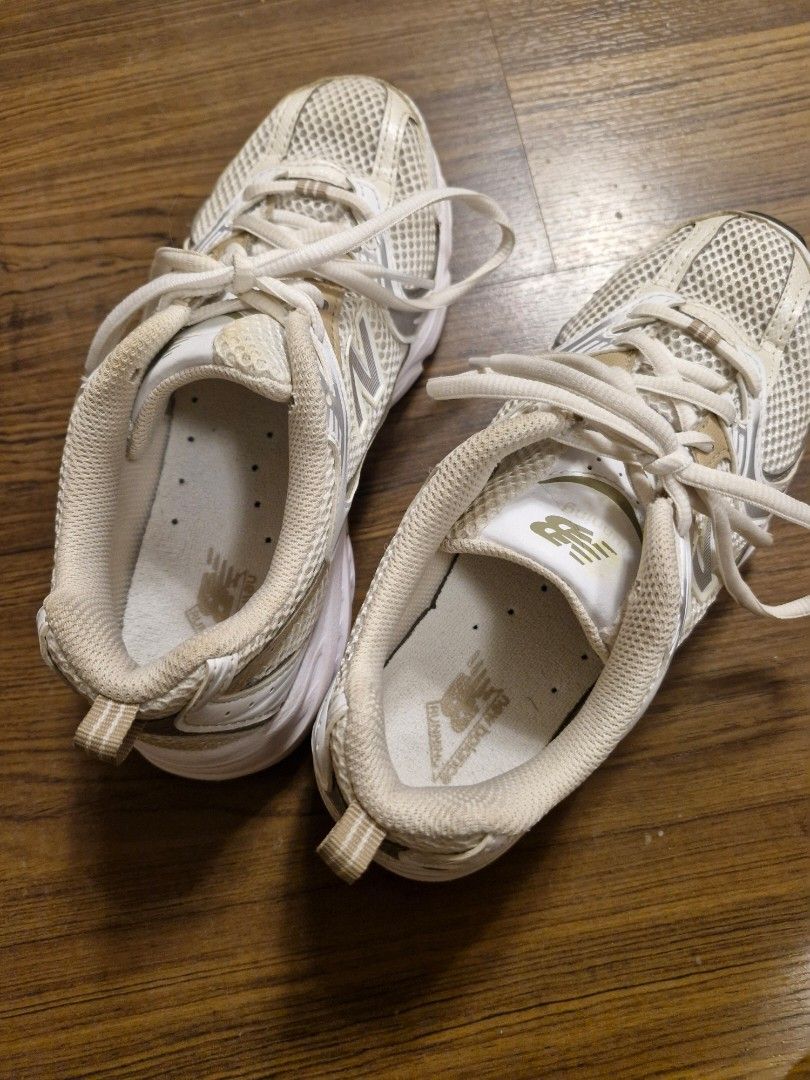 New Balance 530 White/Gold (Category: Sneakers) located in Zamboanga. Submitted by _catflakes (Listing ID 1343679288, Image 2). Description: I got this from New Balance outlet of KCC Mall de Zamboanga. Used only a few times. It doesn't fit me well. Also open for swap for a bigger size Size: 22.5 cm or 37 Euro Price is negotiable. PM for more deets.