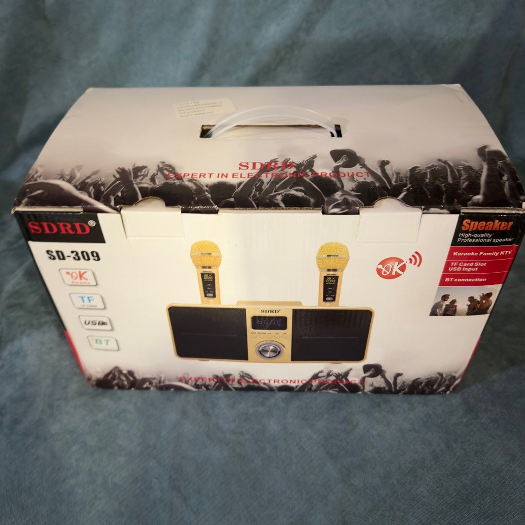 SDRD SD-309 Wireless Bluetooth Dual Microphone Karaoke Portable Stereo Speaker (Category: Portable Music Players) located in Makati City. Submitted by zhenshoppreloved (Listing ID 1343578030, Image 2). Description: Brand new Color: Black Communication : Wireless Package : Yes Model Number : SD309 Support 3D Stereo surround sound ,Two wireless microphones Support Self hi tone One button elimination Bring echo, EQ and other functions. Playback from
