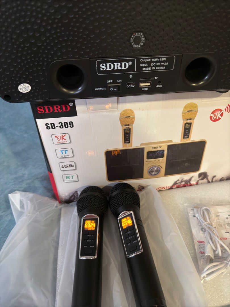 SDRD SD-309 Wireless Bluetooth Dual Microphone Karaoke Portable Stereo Speaker (Category: Portable Music Players) located in Makati City. Submitted by zhenshoppreloved (Listing ID 1343578030, Image 1). Description: Brand new Color: Black Communication : Wireless Package : Yes Model Number : SD309 Support 3D Stereo surround sound ,Two wireless microphones Support Self hi tone One button elimination Bring echo, EQ and other functions. Playback from