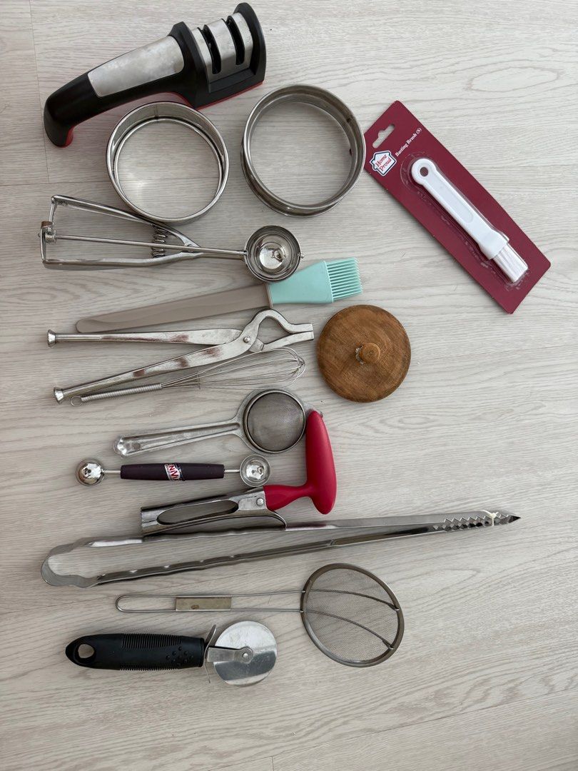 Assorted kitchen items (Category: Other Kitchenware & Tableware) located in Singapore. Submitted by fusionsapiens (Listing ID 1343785710, Image 1). Description: Moving out sale - meet up or pick up from Flora Road only Selling everything as a set Ice cream scoop, knife sharpener, BBQ tongs, cooking rings, core extractor, scooper, pizza cutter, basting brushes etc .