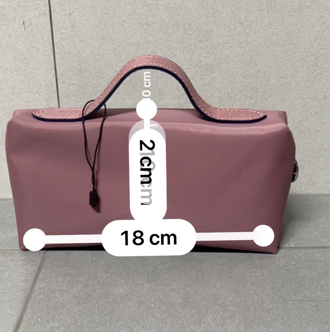 Bag (Category: Bags & Wallets) located in Singapore. Submitted by happyshopnbuy (Listing ID 1343849616, Image 2). Description: Beautiful n stylish Longchamp bags for all occasions 1) Pouch bag in rose pink (19cm/10cm/5cm) - $85 2) Blue Paris theme (30cm/47cm/19cm) - $230 3) Black/white sling bag ( 40cm/30cm/50cm) - $300.