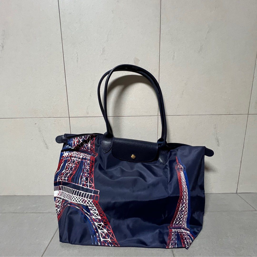 Bag (Category: Bags & Wallets) located in Singapore. Submitted by happyshopnbuy (Listing ID 1343849616, Image 3). Description: Beautiful n stylish Longchamp bags for all occasions 1) Pouch bag in rose pink (19cm/10cm/5cm) - $85 2) Blue Paris theme (30cm/47cm/19cm) - $230 3) Black/white sling bag ( 40cm/30cm/50cm) - $300.