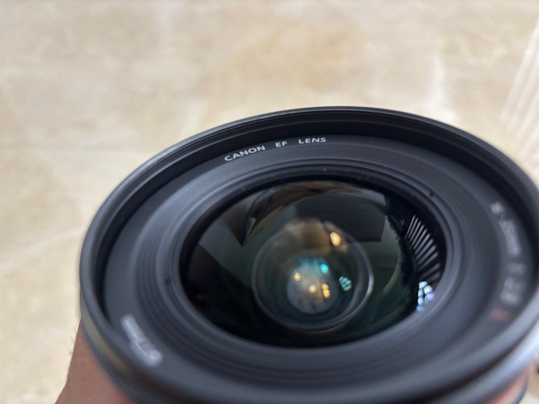Canon 16-35L EF f2.8 (Category: Lens & Kits) located in Manila. Submitted by thenatureo23117 (Listing ID 1343881943, Image 1). Description: Canon 16-35mm f2.8 - sharp output - no dust/fungus. Well kept in moisture free cabinet - with rear cap - lens pouch - faded markings ₱23,000 Negotiable for sure buyers Meetup near SM molino or Bacoor.