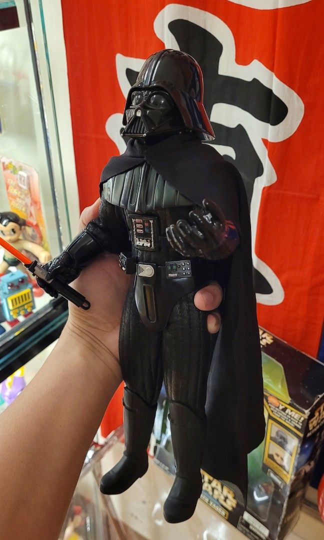 DARTH VADER ELECTEONICS (Category: Figurines & Statues) located in Balanga. Submitted by jhzbl (Listing ID 1343709438, Image 3). Description: Vintage 1998 Kenner -13 inch -batt op -working sounds gimmick -with articulation -removable Mask,helmet,cape,belt,sword -damaged box with manual MOP: GCASH/BDO MOD: LBC.