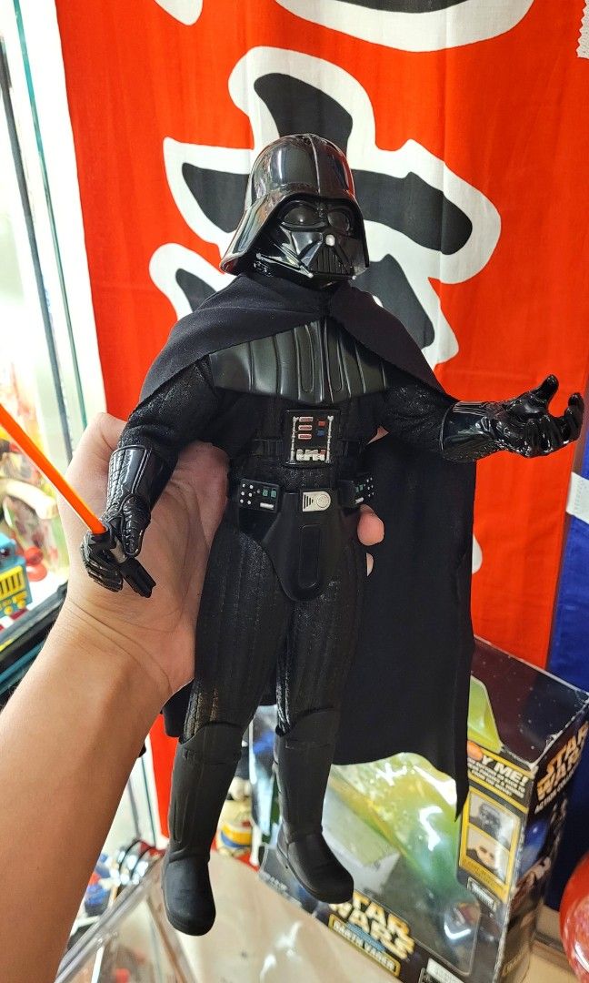 DARTH VADER ELECTEONICS (Category: Figurines & Statues) located in Balanga. Submitted by jhzbl (Listing ID 1343709438, Image 2). Description: Vintage 1998 Kenner -13 inch -batt op -working sounds gimmick -with articulation -removable Mask,helmet,cape,belt,sword -damaged box with manual MOP: GCASH/BDO MOD: LBC.