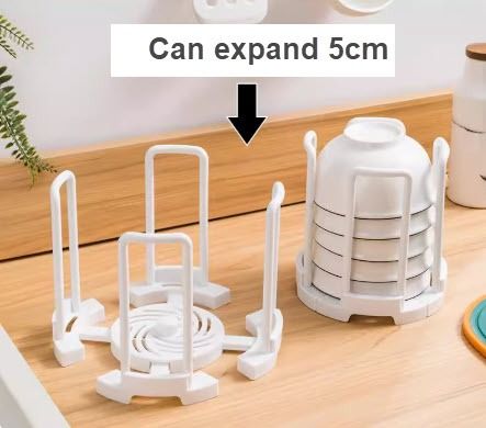 Expandable Drying Bowl Rack Plate holder Kitchen Organizer (Category: Food Organization & Storage) located in Manila. Submitted by classy.home (Listing ID 1343771812, Image 2). Description: Available Color: White Material: PP Plastic Size: - When Folded: Diameter:14 Height:16 (cm) - When Expanded: Diameter:19 Height:16 (cm).