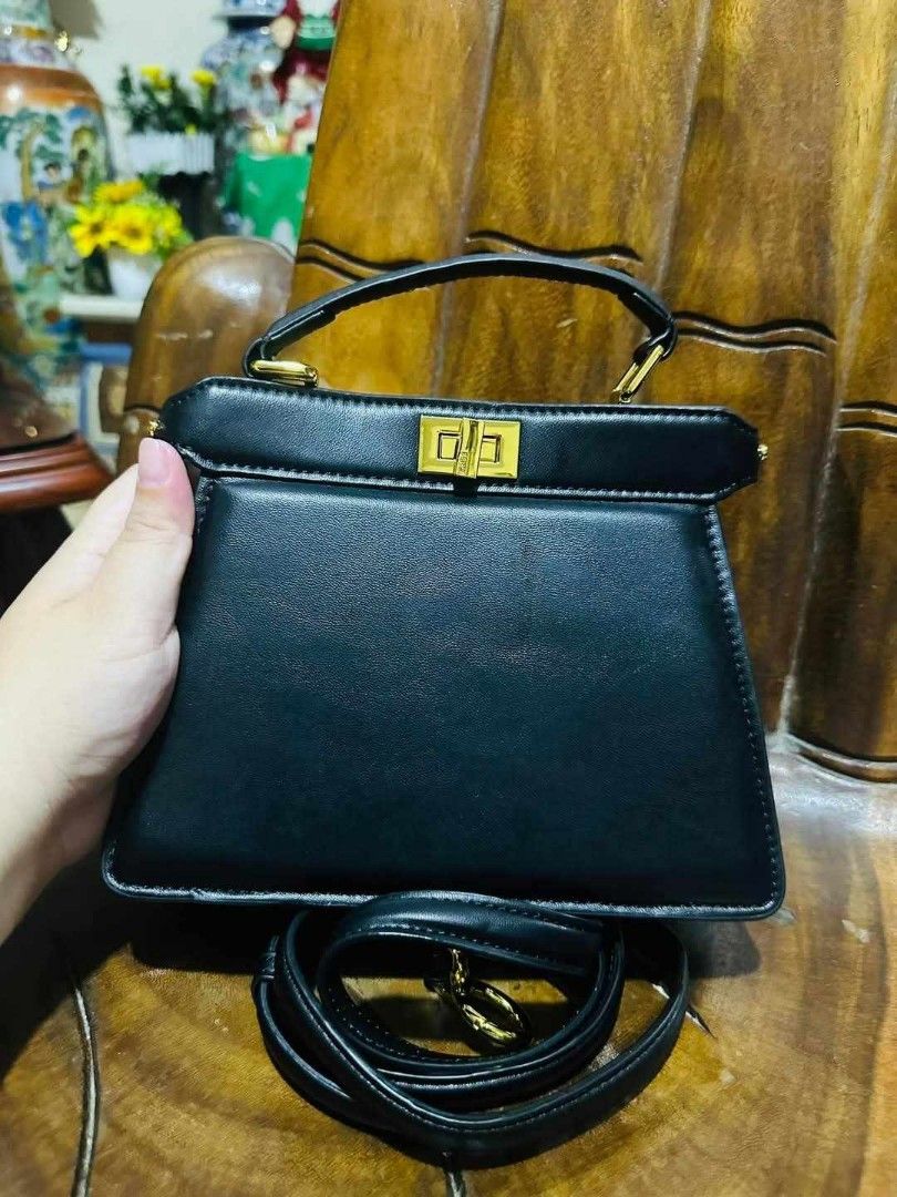 Fendi mini peekabo two way bag (Category: Luxury Bags & Wallets) located in Bulacan. Submitted by alfredcarp0905 (Listing ID 1343813694, Image 2). Description: PRELOVED!! IN VERY GOOD CONDI TAG INSIDE NO FLAWS NO ISSUE NOT GUARANTED DM TO PURCHASE THANK YOU.