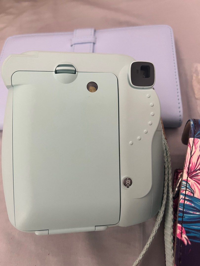 Fujifilm Instax Mini 9 Ice Blue (Category: Cameras) located in Caloocan City. Submitted by klutter_b (Listing ID 1343739028, Image 2). Description: Details: - Bought from Fujifilm SM Fairview - September 2019 Inclusions: - Flamingo Case & Sling bought upon purchase of the camera (from Fujifilm) - Hand strap - Close-up lens attachment - Blue photo album - 8 films inside the camera Sample photo taken from December 26, 2024 Without box I can provide