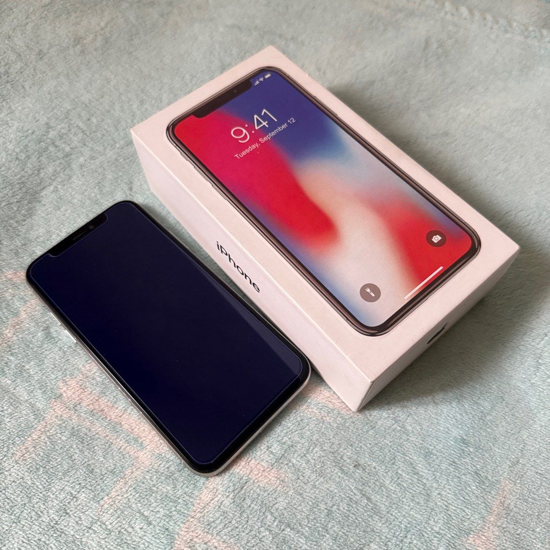 Iphone X 64gb for sale (Category: iPhone X Series) located in Mandaluyong City. Submitted by ukiyokim (Listing ID 1342527727, Image 1). Description: ❌Auto pass for low ballers iPhone X • Lady owned 64gb White 98% smooth ISSUE Battery: Replaced LCD: Replaced No True Tone No Face ID Inclusion: Box only Open for meet up Test all you want Meet up: MRT Boni (Uncle Johns) or SM Marilao Delivery: Same day delivery for nearby or via LBC .
