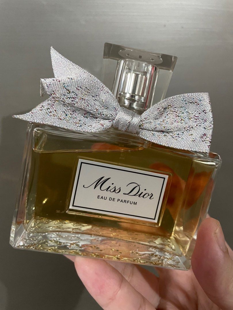 Miss Dior (Category: Fragrance & Deodorants) located in Quezon City. Submitted by pickitty (Listing ID 1343840009, Image 3). Description: Sprayed once thus yellow discoloration Authentic with paperbag, receipt.