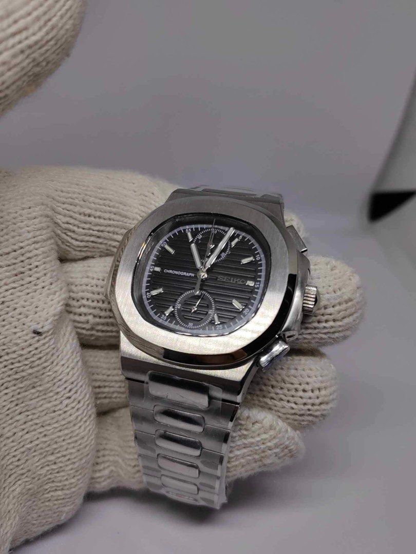 Nautilus With Chrono Black (Category: Luxury Watches) located in Manila. Submitted by moneyunlimited (Listing ID 1343864241, Image 2). Description: Brandnew With warranty 5999 only VK63 s e i k o. mechanism Not china mechanism Sapphire Glass 904L band Aftermarket japan parts used Complete set of box and tools.