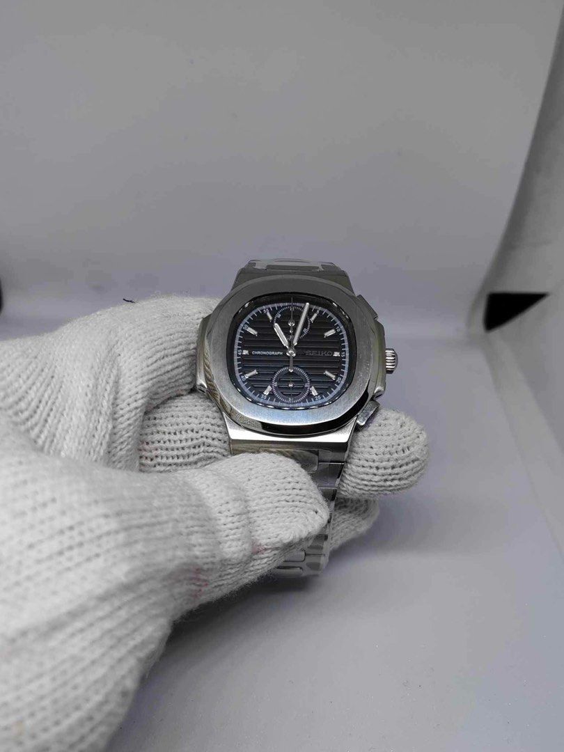 Nautilus With Chrono Black (Category: Luxury Watches) located in Manila. Submitted by moneyunlimited (Listing ID 1343864241, Image 3). Description: Brandnew With warranty 5999 only VK63 s e i k o. mechanism Not china mechanism Sapphire Glass 904L band Aftermarket japan parts used Complete set of box and tools.