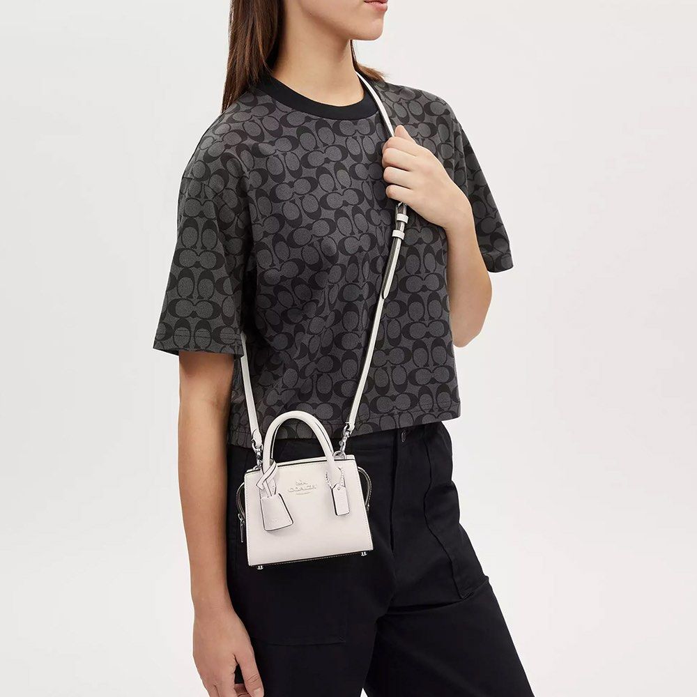 OG Coach Andrea White Bag (Category: Luxury Bags & Wallets) located in Manila. Submitted by secondchanceplease (Listing ID 1343858280, Image 2). Description: Inclusion: Card • Available in White • Dimension: L6in W3.2in H4.5in.