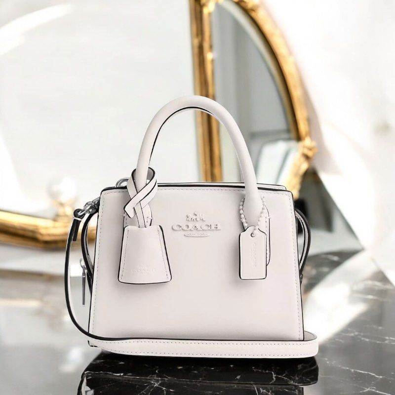 OG Coach Andrea White Bag (Category: Luxury Bags & Wallets) located in Manila. Submitted by secondchanceplease (Listing ID 1343858280, Image 1). Description: Inclusion: Card • Available in White • Dimension: L6in W3.2in H4.5in.