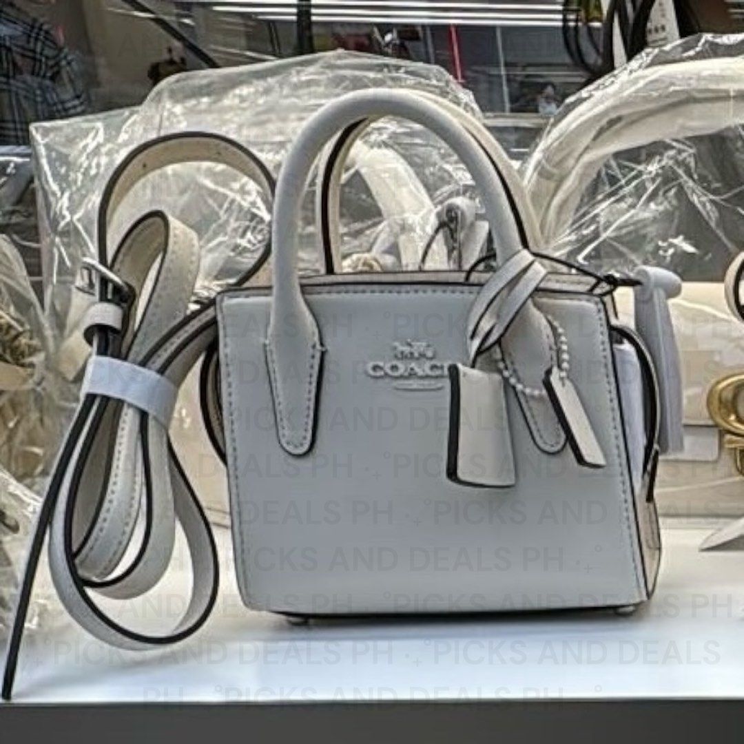 OG Coach Andrea White Bag (Category: Luxury Bags & Wallets) located in Manila. Submitted by secondchanceplease (Listing ID 1343858280, Image 3). Description: Inclusion: Card • Available in White • Dimension: L6in W3.2in H4.5in.