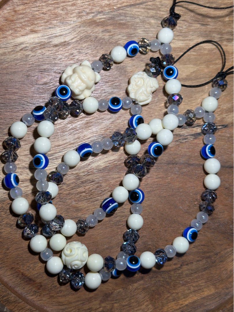 Phone strap with Evil Eye, Ivory nut, and Austrian Crystals (Category: Other Accessories) located in Cavite. Submitted by dazzling_crystals (Listing ID 1343746973, Image 1). Description: No meet ups, no cod Gcash payment. Shipping: buyer via J&T #swarovski #ivorynut.