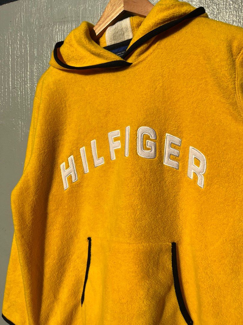Tommy Hilfiger Yellow Hoodie (Category: Hoodies) located in Manila. Submitted by triptee_kings (Listing ID 1343858036, Image 1). Description: Tommy hilfiger (Authentic) 23.5x28.5 No issue.