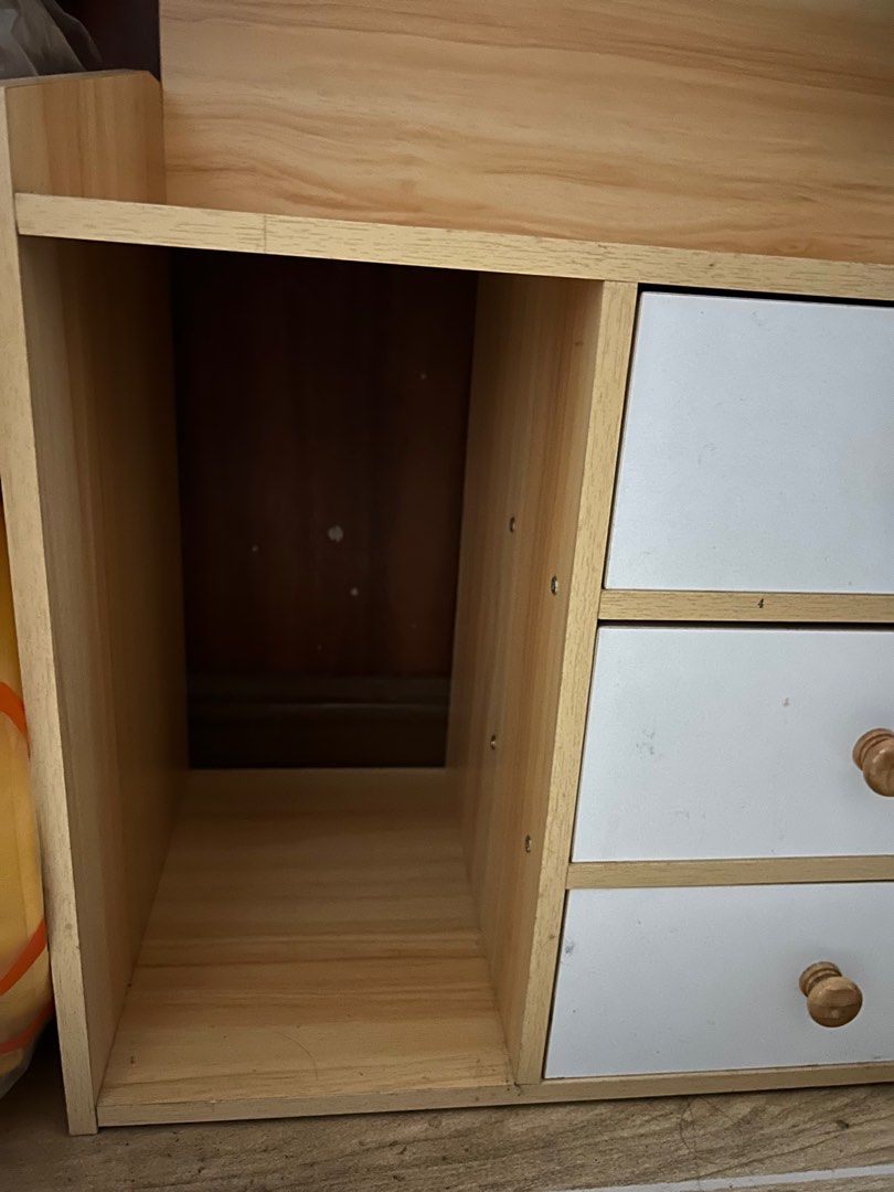 Wooden Mini Cabinet with Drawers (Category: Shelves, Cabinets & Racks) located in Makati City. Submitted by declutterwjn_ (Listing ID 1343811729, Image 2). Description: Used but not abused. Only put light accessories so wood isn’t too worn out. Selling cos needed a bigger cabinet. Already assembled, would need to be picked up or Lalamove-d. Size: Length 20 inches, Height 32 inches including back board, Width 12 inches.