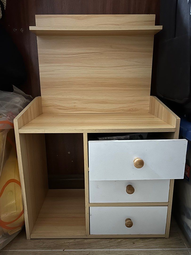 Wooden Mini Cabinet with Drawers (Category: Shelves, Cabinets & Racks) located in Makati City. Submitted by declutterwjn_ (Listing ID 1343811729, Image 3). Description: Used but not abused. Only put light accessories so wood isn’t too worn out. Selling cos needed a bigger cabinet. Already assembled, would need to be picked up or Lalamove-d. Size: Length 20 inches, Height 32 inches including back board, Width 12 inches.