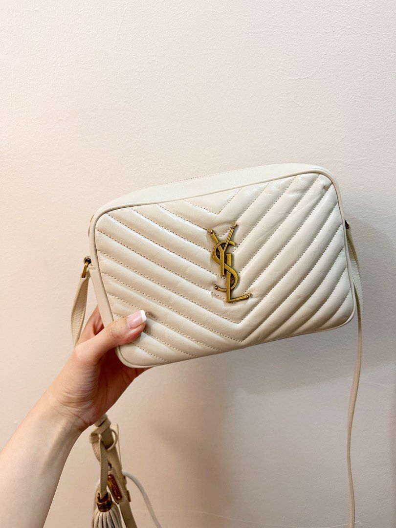 Authentic YSL camera lou bag (Category: Luxury Bags & Wallets) located in Manila. Submitted by shopelisse (Listing ID 1344023460, Image 1). Description: With dustbag.