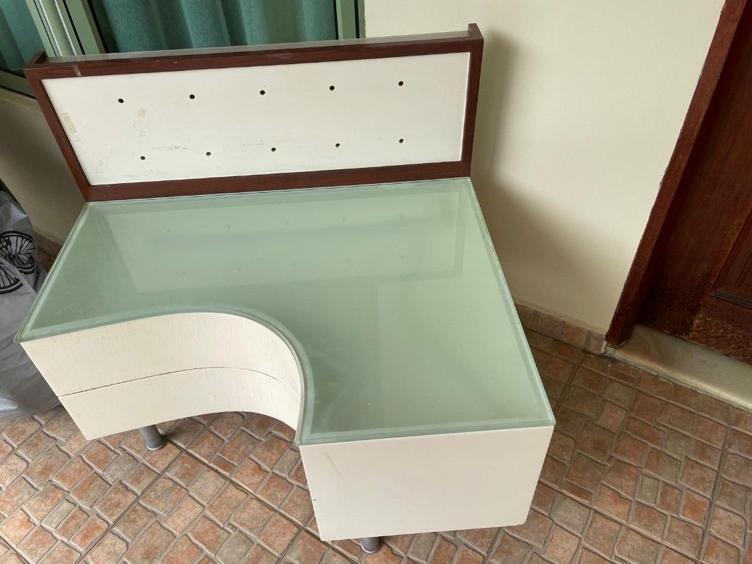 Bed side table (Category: Tables & Sets) located in Singapore. Submitted by mmiieu (Listing ID 1343907647, Image 1). Description: bedside table. comes in two parts, one is the wood coloured backing and the other part is white with a removable frosted glass top. able to insert led lights to light up table and backing board. collect free from Poh Huat road. there is a matching headboard but located at another place if you're interested..
