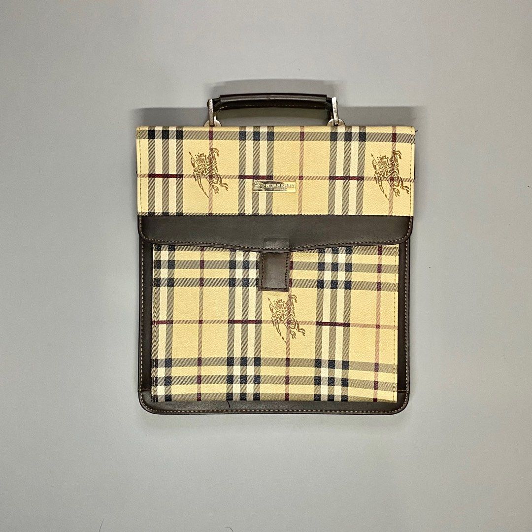 BURBERRY Crossbody bag (Category: Luxury Bags & Wallets) located in Baguio. Submitted by macshop_items (Listing ID 1343968428, Image 1). Description: BURBERRY Crossbody bag - Excellent condition - Missing sling - L 11.5 x W 10.5 ₱ 1,880 + sf.