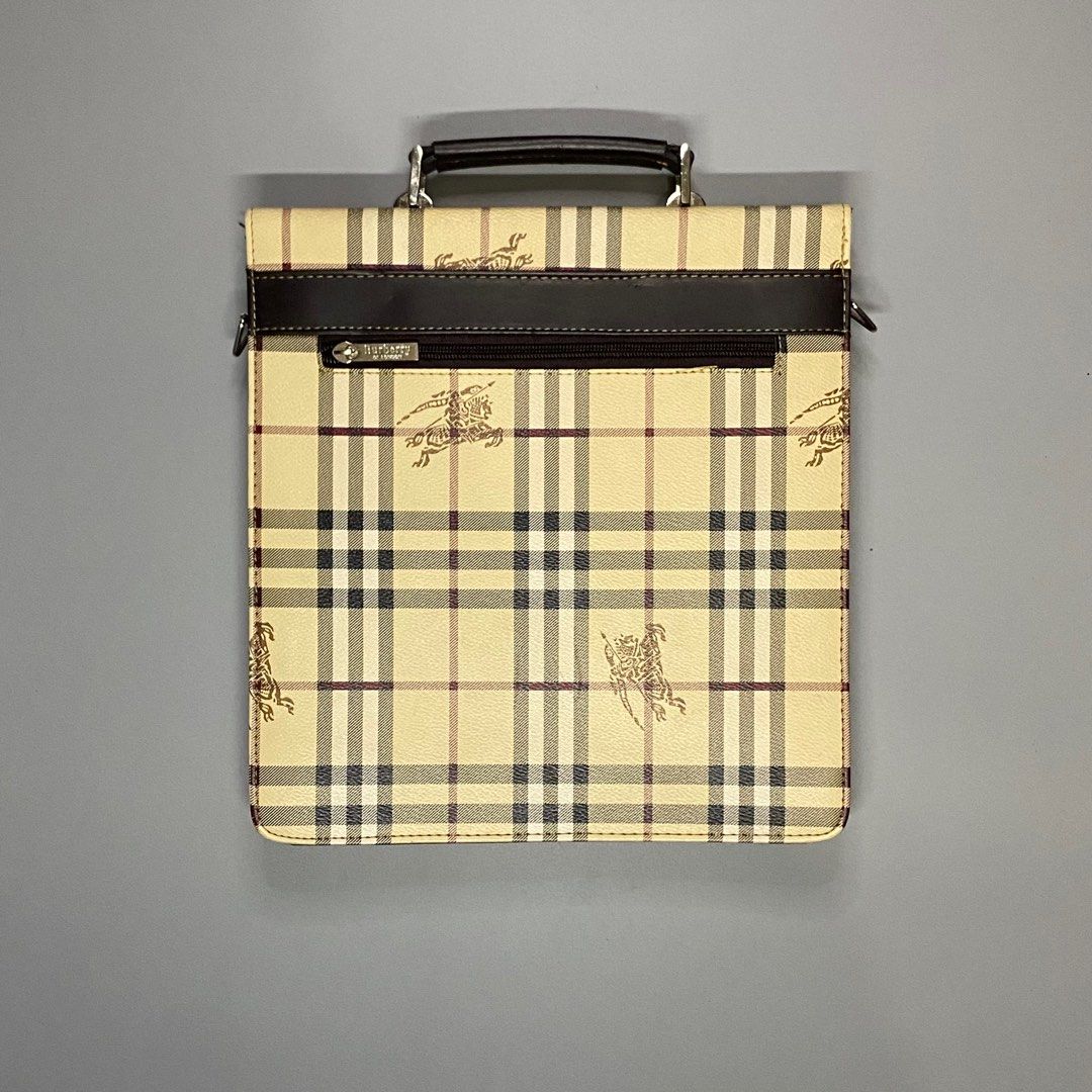 BURBERRY Crossbody bag (Category: Luxury Bags & Wallets) located in Baguio. Submitted by macshop_items (Listing ID 1343968428, Image 3). Description: BURBERRY Crossbody bag - Excellent condition - Missing sling - L 11.5 x W 10.5 ₱ 1,880 + sf.