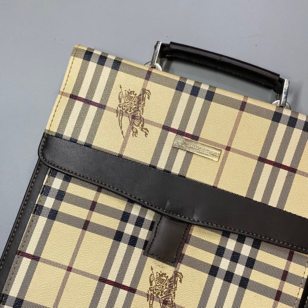 BURBERRY Crossbody bag (Category: Luxury Bags & Wallets) located in Baguio. Submitted by macshop_items (Listing ID 1343968428, Image 2). Description: BURBERRY Crossbody bag - Excellent condition - Missing sling - L 11.5 x W 10.5 ₱ 1,880 + sf.